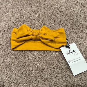 Nwt baby/infant headband mustard yellow 3-36 months